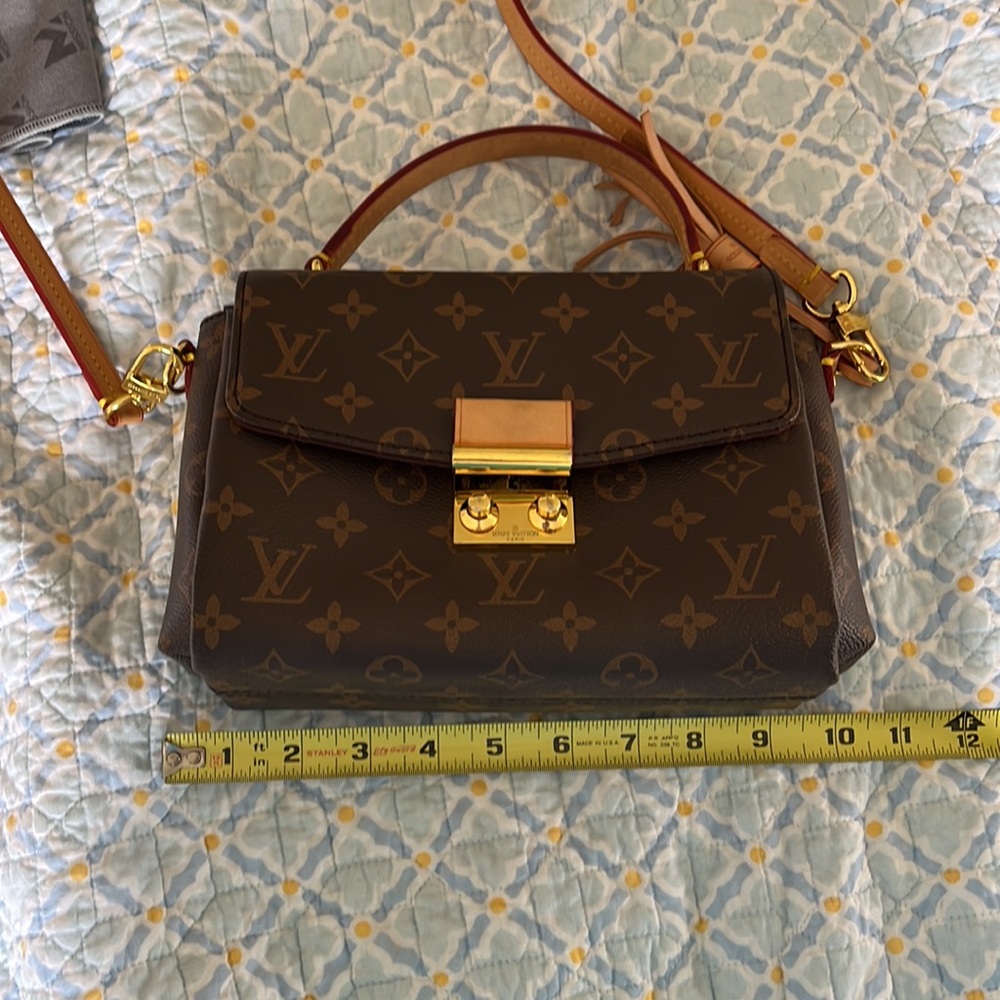 Pochette Mettis Brown satchel bag